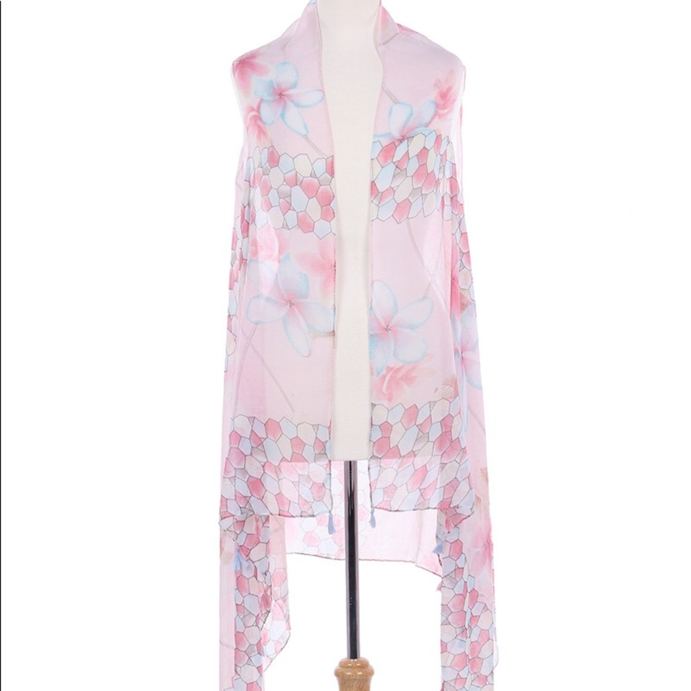 Assorted Vest Coverups with fringe tassels.